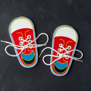 Pair of wooden lacing shoes