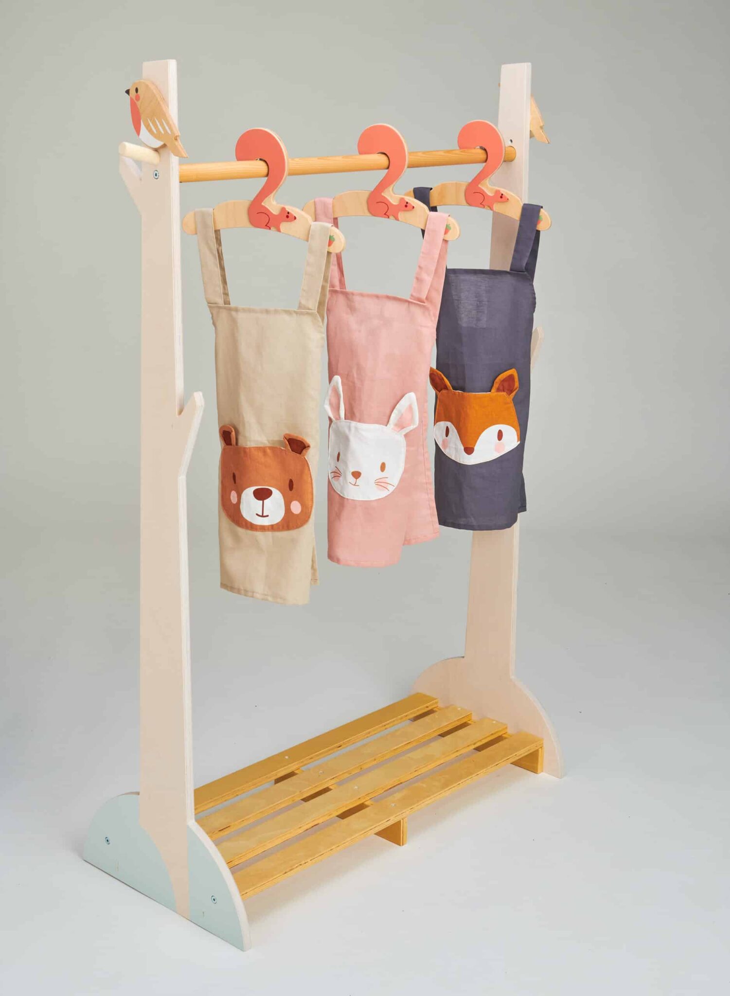 3 x aprons on clothes rail aprons on rail